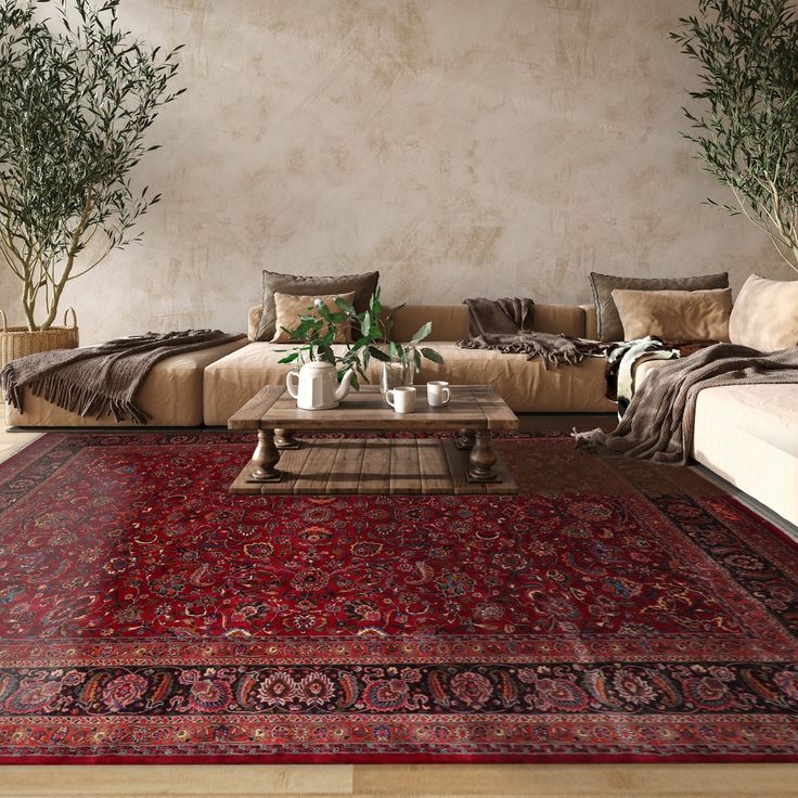 a living room filled with furniture and rugs