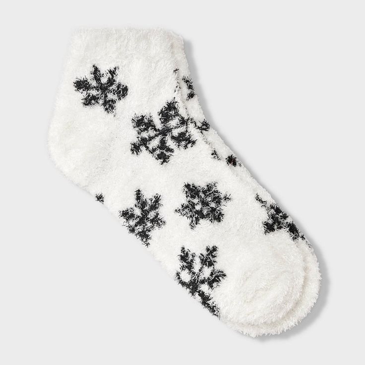 Wrap your feet in warmth and comfort with the Women's Snowflake Cozy Low Cut Socks - Auden™ 4-10. These soft, snug socks feature a playful snowflake pattern that adds a fun touch to your loungewear. Perfect for chilly days or relaxing at home, they’re made to keep your feet warm all day long. With a comfy fit and a bit of flair, these socks are a cozy essential for your wardrobe. Auden™: Fit for you in every way. Low Cut Socks, Target Clothes, Snowflake Pattern, Sock Shop, Fabric Names, Socks And Hosiery, Comfy Fits, Star Patterns, Socks Women