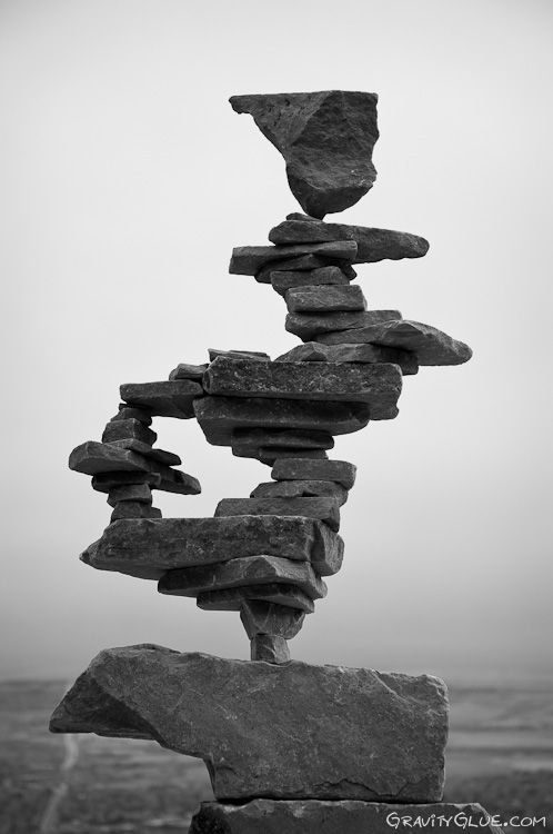 black and white photograph of rocks stacked on top of each other