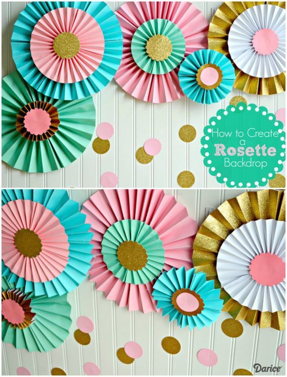 how to make paper rosette backdrops with gold and blue colors on the wall