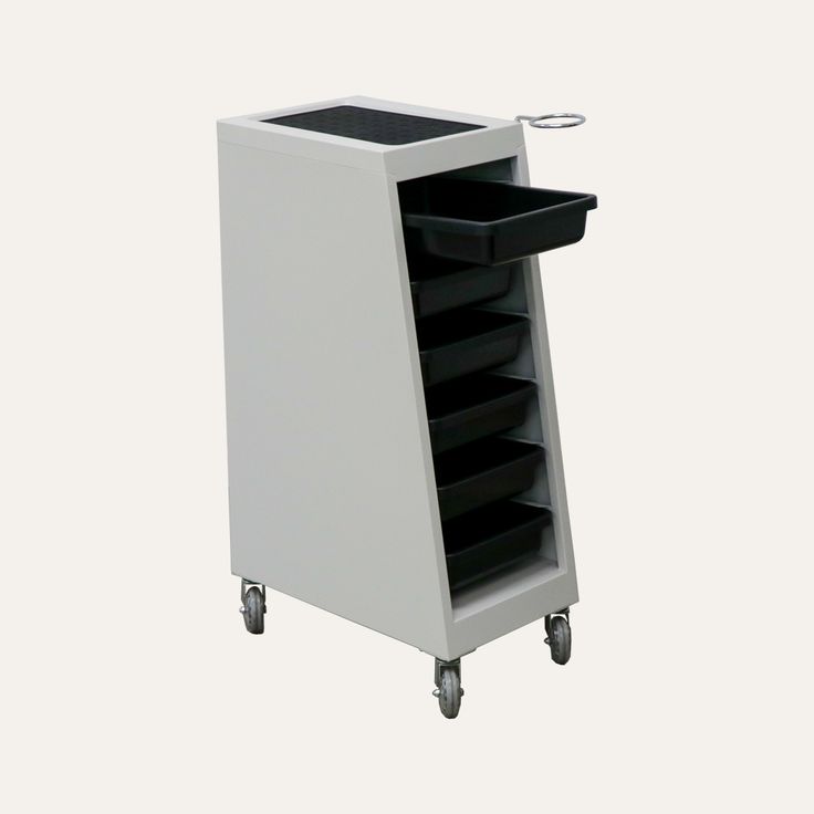 a white cart with black drawers and wheels on the bottom is shown in front of a white background