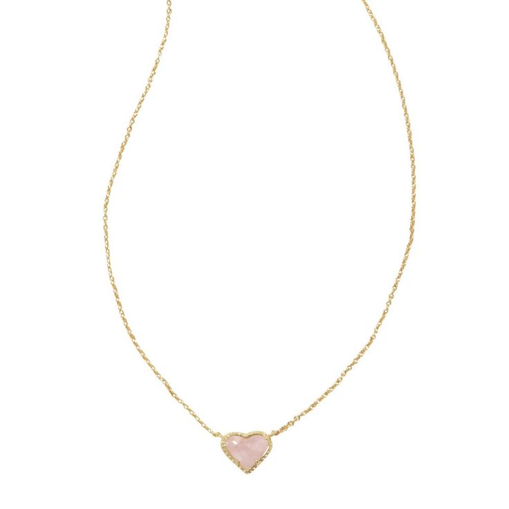 Dainty, sweet, and oh-so-chic, the Anna Pendant Necklace will have you feeling the love. An adorable heart pendant on a delicate chain, style this sweet necklace solo or stacked for a fun, flirty look. To preserve your fashion jewelry for years to come, agents such as soaps, perfumes, lotions, makeup, hair and cleaning products, and other chemical contact should be avoided. Take care to remove jewelry before showering, sleeping, exercising or swimming. Kendra Scott is known for its design and ma Feminine Heart Charm Necklace For Mother's Day, Chic Jewelry For Valentine's Day Gift, Feminine Jewelry For Valentine's Day, Feminine Heart Necklace As A Valentine's Day Gift, Feminine Heart Necklace For Valentine's Day Gift, Pink Necklace For Everyday And Valentine's Day, Delicate Pink Necklace For Valentine's Day, Feminine Heart Charm Necklaces For Valentine's Day, Delicate Charm Necklace For Valentine's Day