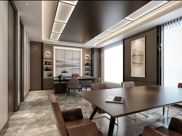 a large conference room with leather chairs and a wooden table in the center, along with built - in bookshelves