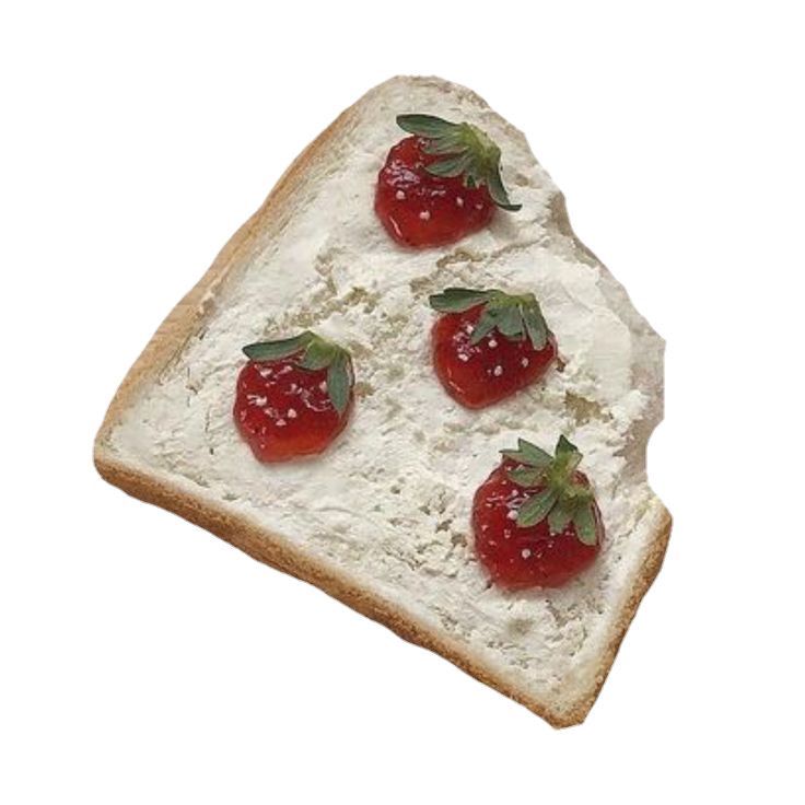 a piece of bread with cheese and strawberries on it