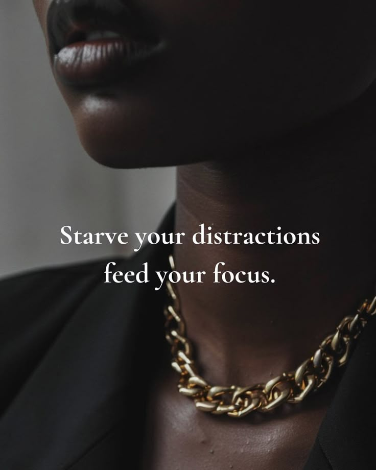 a woman wearing a gold chain necklace with the words scarve your instructions feed your focus