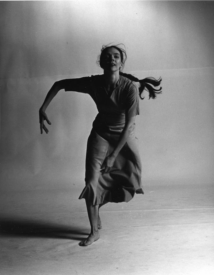 black and white photograph of a woman dancing