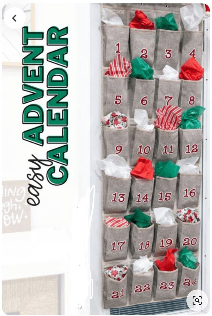 an ad for the holiday calendar hanging on a wall with stockings and socks in it