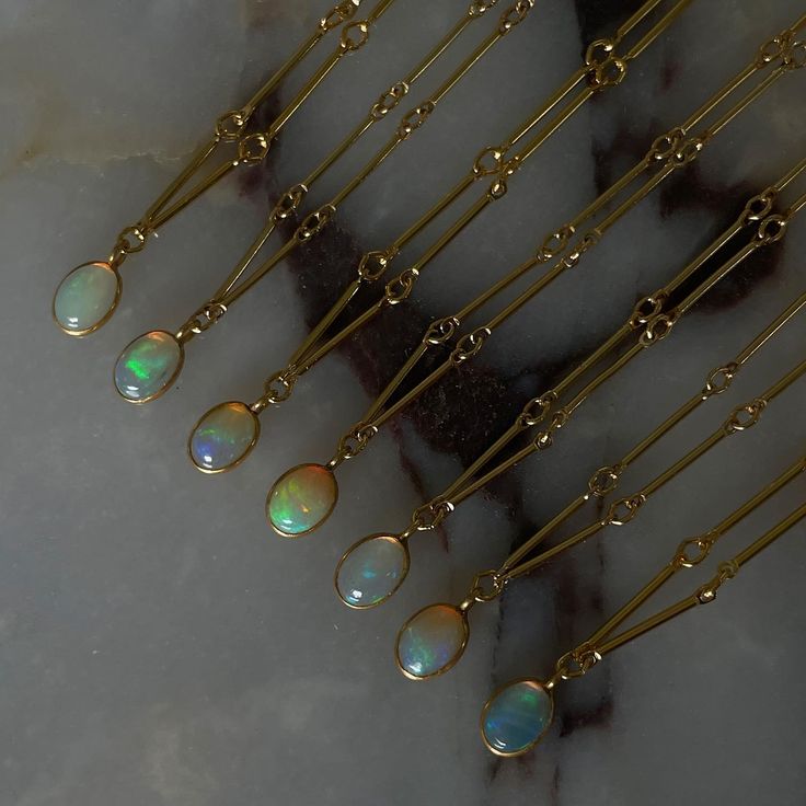 The Sol necklace is part of our LUXE line. It features a unique and genuine Ethiopian opal laying on the highest quality of 24k gold filled materials. Gold-filled chain features a intricate link design. Read more about our Ethiopian Opals here MATERIALS Hand-made 100% 18k gold filled Ethically mined, Genuine Ethiopian Opal (please note that opals are unique in color and have different color shifts to them) MEASUREMENTS 16 inches in length Luxury Ethiopian Opal Heirloom Jewelry, Lesbian Love Quotes, Opal Necklace Gold, Ethiopian Opal Jewelry, Smoked Mirror, Flower Bar, Link Design, Opal Necklace, Magpie