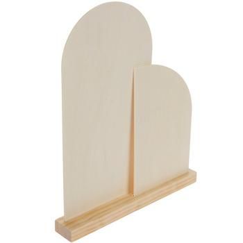 two wooden heart shaped bookends sitting next to each other on a white background