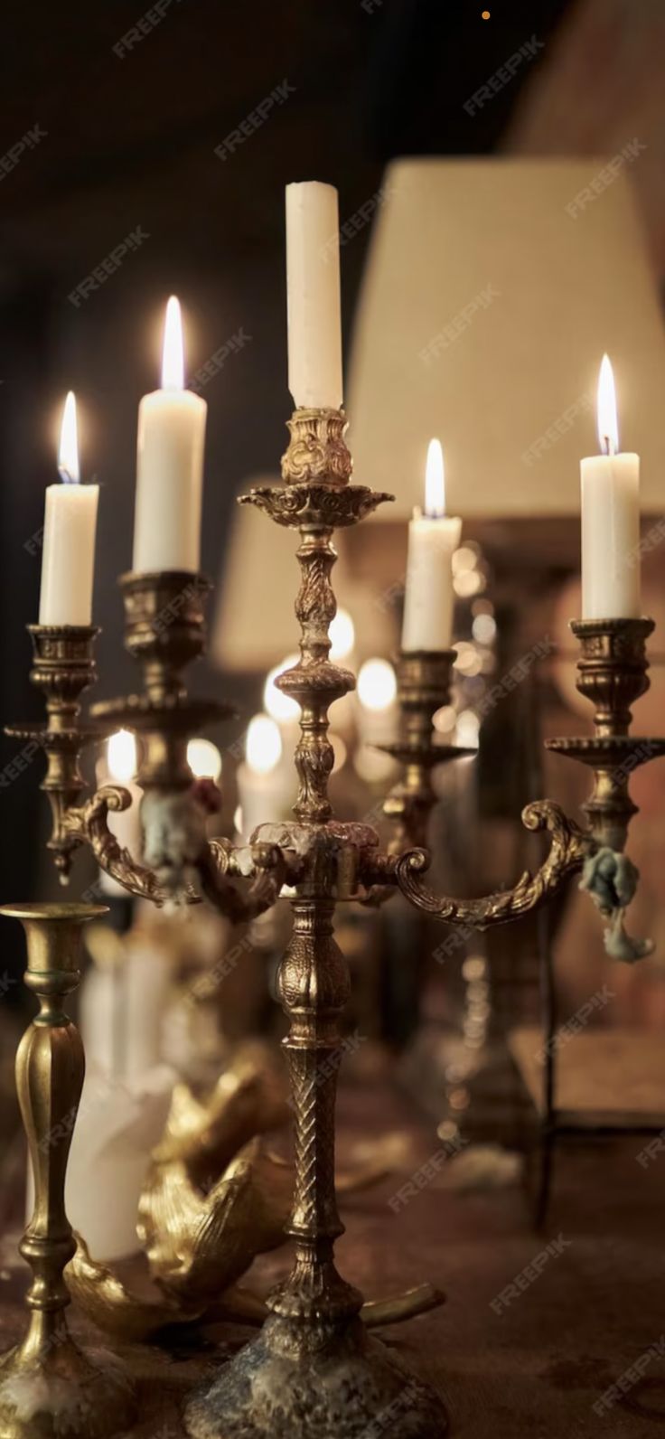 a candelabra filled with lit candles on a table