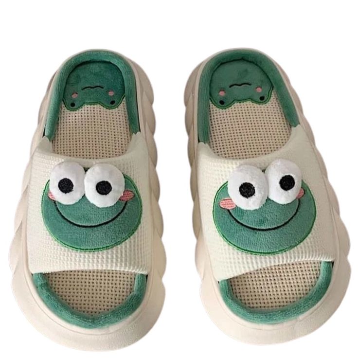 a pair of shoes with eyes on them