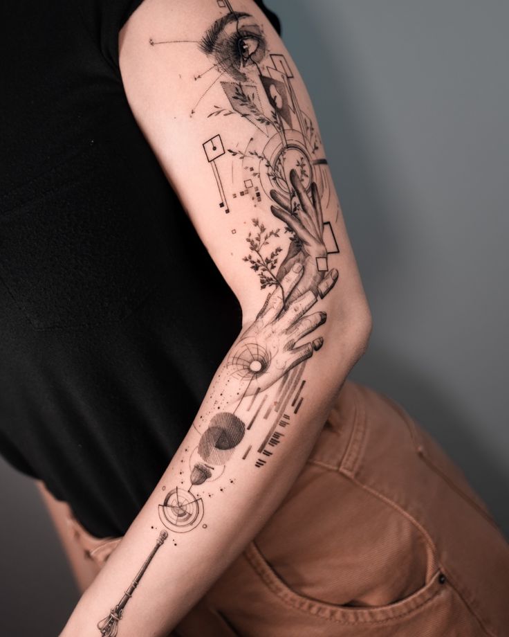 a woman with a tattoo on her arm