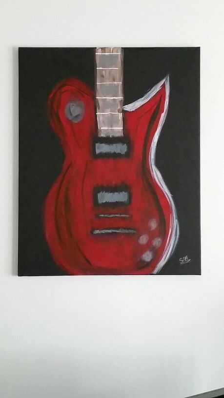 a painting of a red guitar hanging on the wall