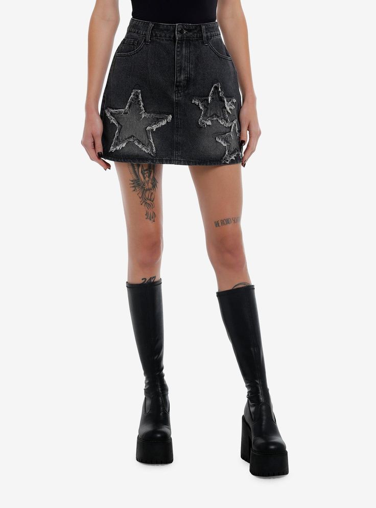 It's a baddie summer! Step outside with this black denim skirt. It has an A-line silhouette  and features star patches on the front with frayed detailing. Comes with hip and back pockets.Please note: Style is fitted with no stretch; size up for a looser fit.100% cottonWash cold; dry flatNon-stretch materialLength: 16''ImportedListed in junior sizesModel is 5'10''Model wears size Small Black Denim Pleated Skirt, Black Denim Punk Skirt, Black Punk Denim Skirt, Punk Black Denim Skirt, Black Punk Denim Skirt For Spring, Punk Style Mini Denim Skirt For Summer, Black Punk Denim Skirt For Streetwear, Punk Style Black Mini Denim Skirt, Black Punk Denim Skirt For Summer