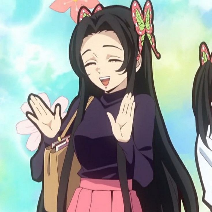 a woman with long black hair and pink skirt holding her hands up in the air