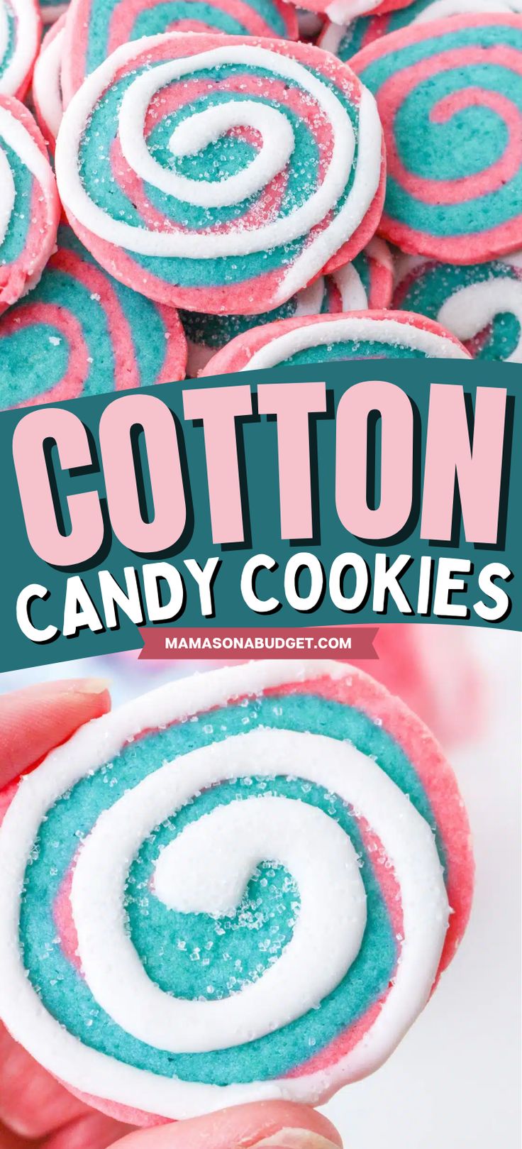 cotton candy cookies with blue, pink and white frosting on top are being held by someone's hand