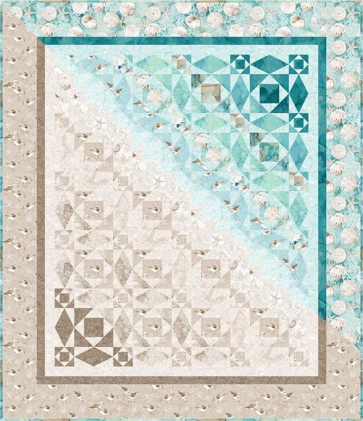 a blue and white quilt with an abstract design on the front, in shades of green