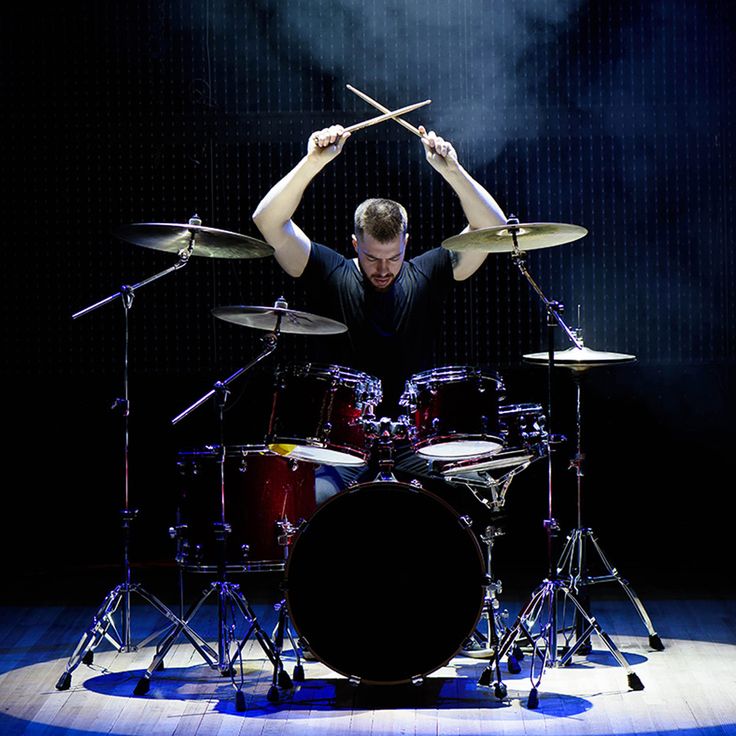 a man playing drums with the words, what you need when you're becoming a drummer