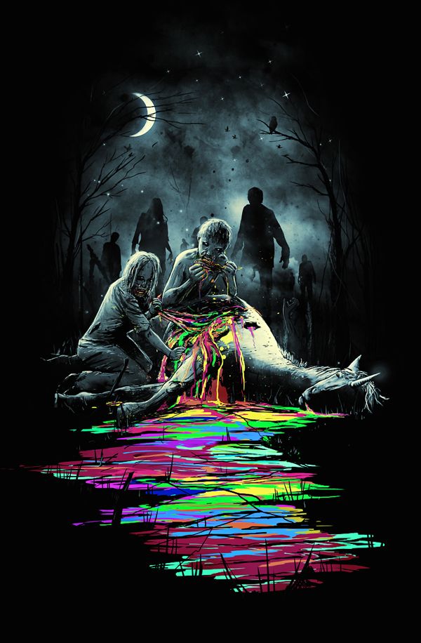 two people sitting on the ground in front of a dead animal with neon paint all over it