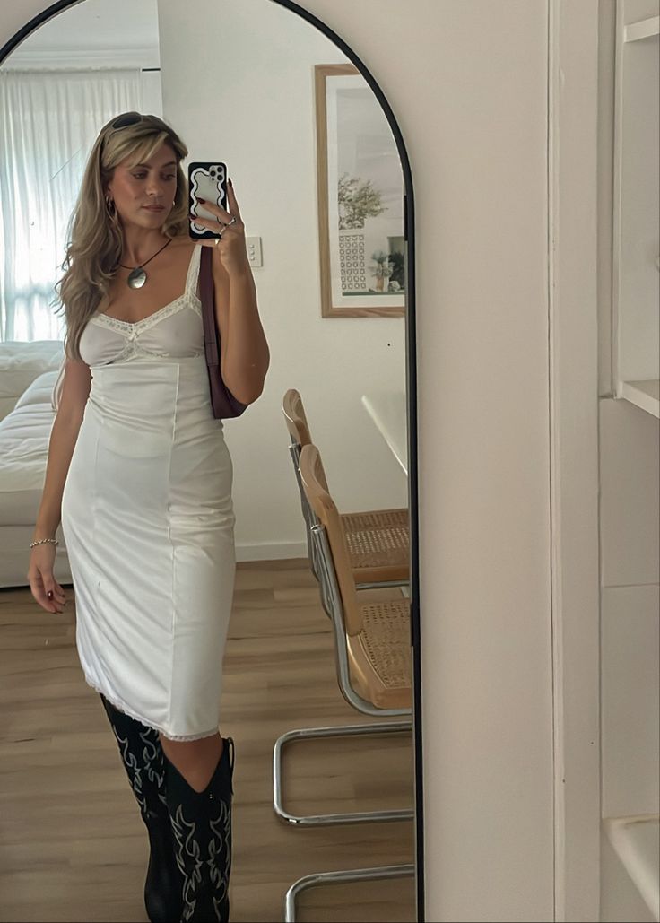 vintage slip dress outfit aesthetic cowboy boots Vintage Slip Dress Outfit Aesthetic, French Slip Dress Outfit, Vintage White Slip Dress Outfit, Short Slip Dress Outfit Winter, Male Outfit Ideas Aesthetic, Short Slip Dress Outfit, Slip Dress Outfit Aesthetic, Vintage Slip Dress Outfit, White Slip Dress Outfit