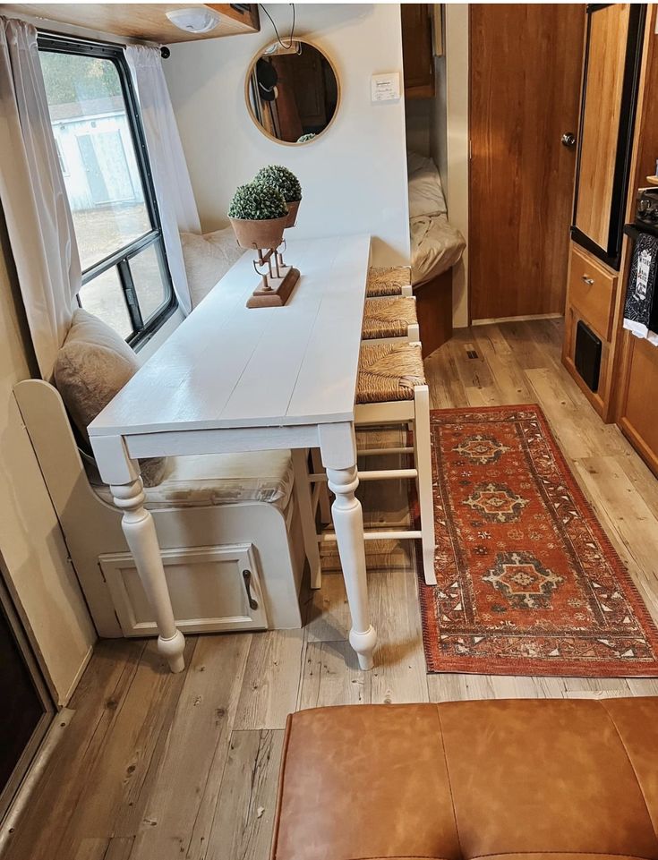 a living room and kitchen area in a mobile home