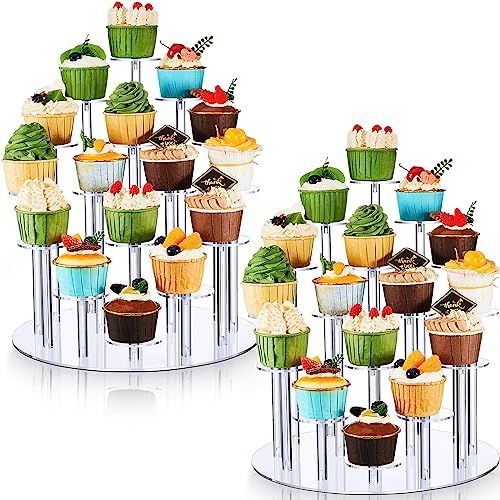 cupcakes are arranged in the shape of a tower