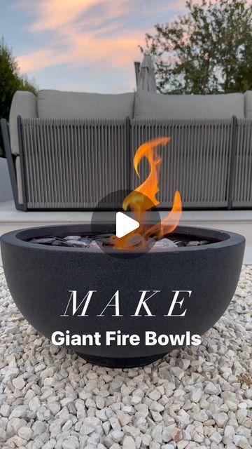 an outdoor fire pit with the words make giant fire bowls