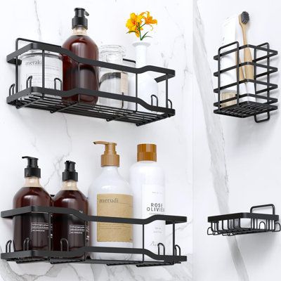 two black bathroom shelves with soap, lotion and hand sanitizers on them