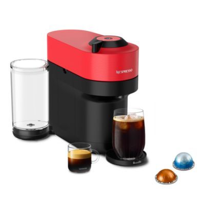 a red and black coffee maker sitting next to two glasses with liquid in them on a white background