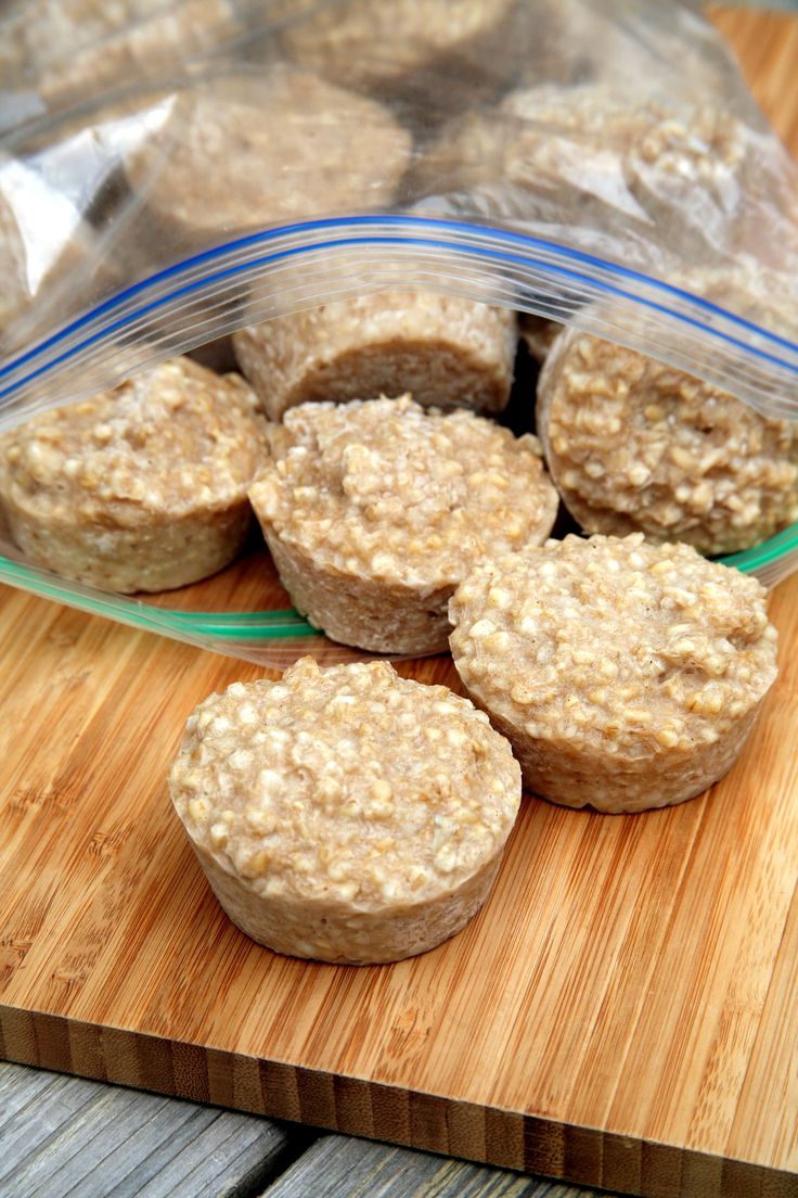 some oatmeal muffins are on a cutting board