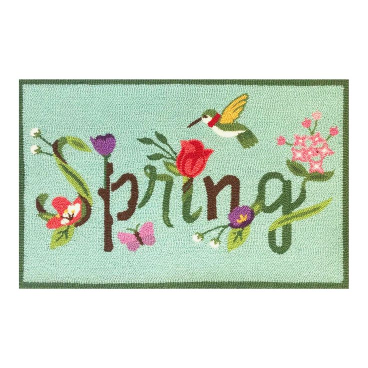 a door mat that says spring with flowers and hummings on the front, in green