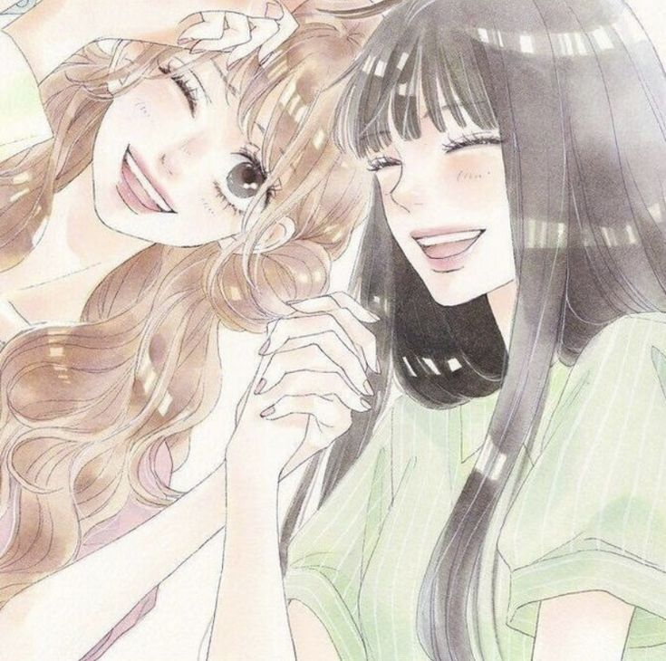 two young women with long hair are smiling and touching each other's foreheads