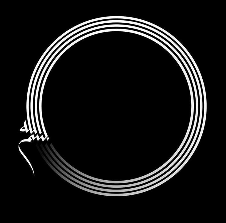 a white circular object on a black background with long lines in the shape of an arrow