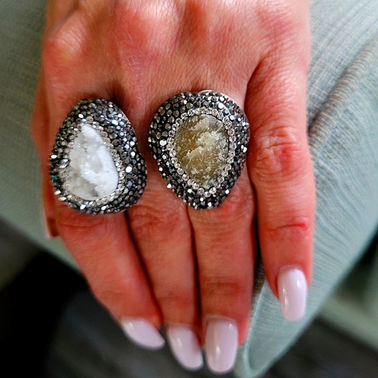 Special Fall Price.....Wow Is This The Latest Designs Out In Jewelry.....Genuine Druzy Quartz Double Ring...One Size Is White Druzy The Other Is Natural....This Is Not For The Faint Of Heart....Sexy Sophisticated All The Way...Each Stone Is Surrounded By Swarovski Black And Clear Crystals...925 Sterling Base....As Pictured The Ring Is Worn On The Middle Finger....Truly A Show Stopper. Be Sure To Check Out My Store With Matching Bracelets And Earrings Available Make Sure To Check Out My Stores Li Glamorous White Rings For Party, Glamorous White Ring Jewelry, Glamorous White Jewelry Ring, White Crystal Ring With Diamond Accents For Party, Luxury Crystal Gemstone Ring For Party, White Crystal Rings For Parties, Elegant Crystal Rings With Stones, White Diamond Jewelry With Stones, Sterling Silver Party Rings With Sparkling Stones