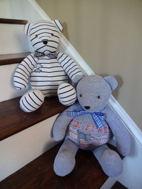 two teddy bears are sitting on the stairs