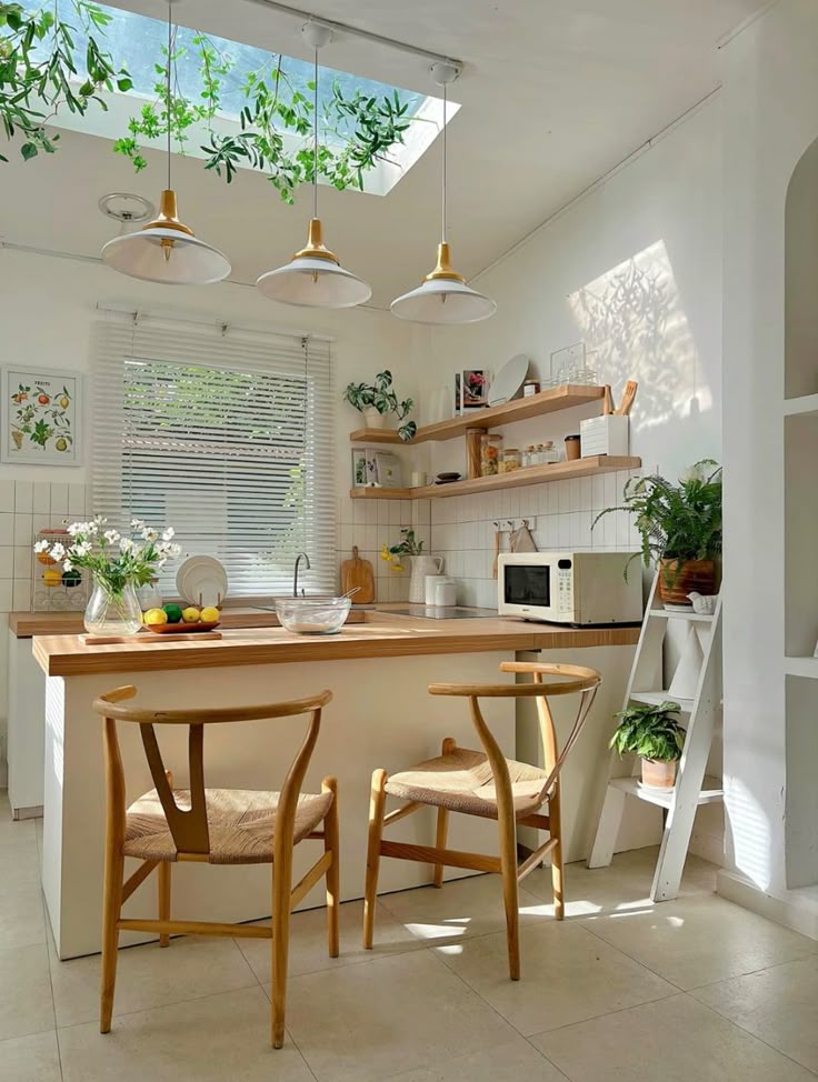 the kitchen is clean and ready to be used for cooking or eating, as well as other things that can be seen in the window