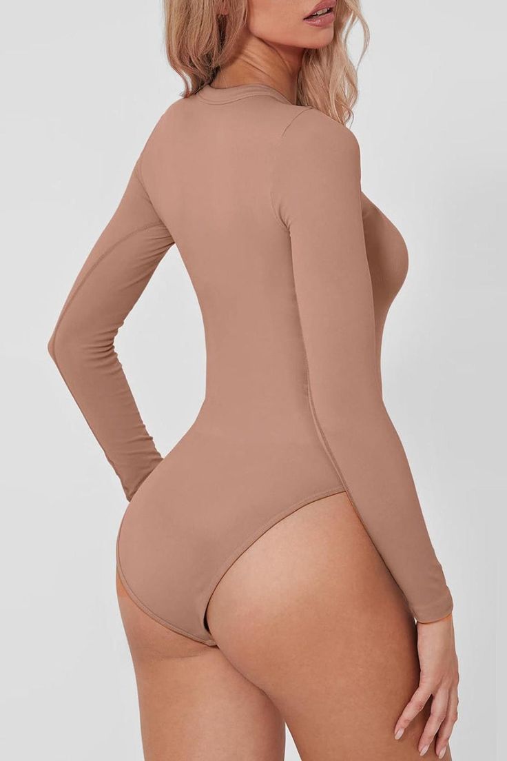 Features: Basic style Sheer: Opaque Stretch: Slightly stretchy Material composition: 100% polyester Care instructions: Machine wash cold. Tumble dry low. Imported Size US Top Length Bust Sleeve Length Shoulder Waist S 2/4 27.2 30.7 23.2 12.2 26.8 M 6/8 27.6 32.3 23.6 12.6 28.3 L 10 28 33.9 24 13 29.9 Dress Bra, Maxi Dress Formal, Loungewear Sets, Short Leggings, Formal Evening Dresses, Basic Style, Long Sleeve Bodysuit, Denim Top, Swimwear Tops