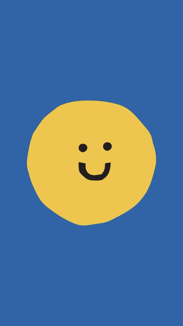 a yellow smiley face on a blue background