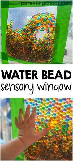 the water bead window is made from plastic beads and has a hand reaching for it