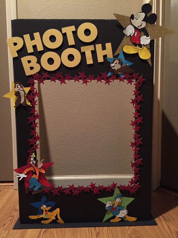 a mickey mouse photo booth frame with stars on it