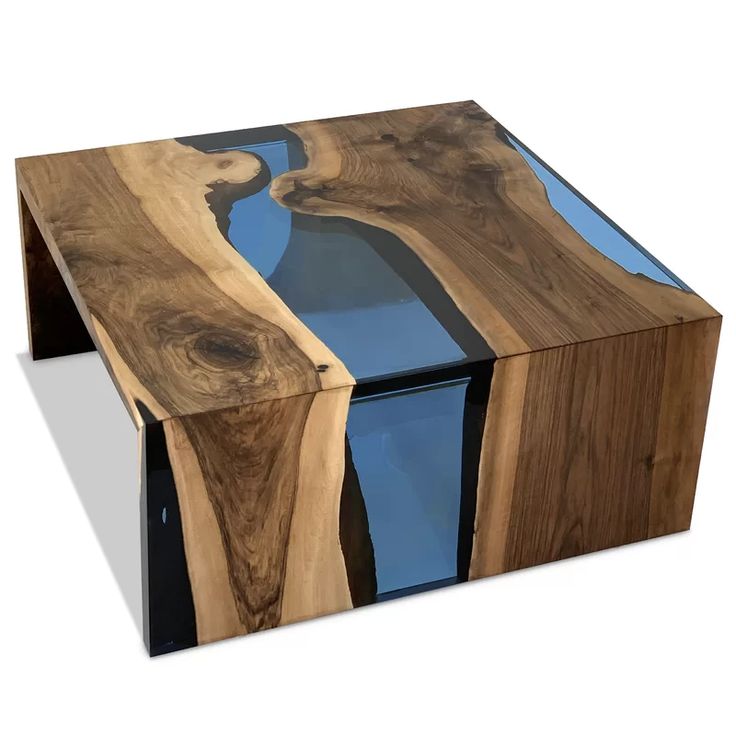 a wooden table with blue glass in the center and wood grain on it's sides