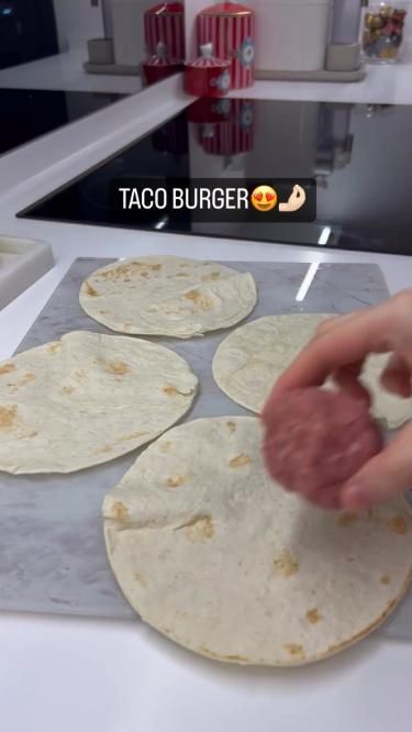 someone is making tortillas on the counter