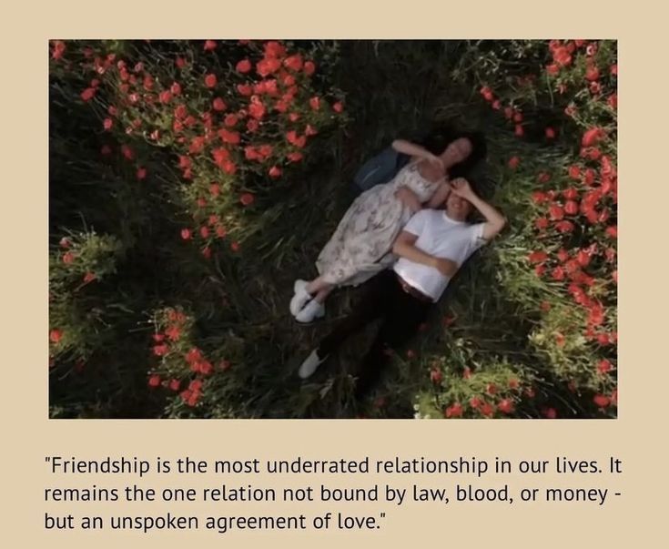 two people laying on the ground in front of flowers with a quote about love and affection