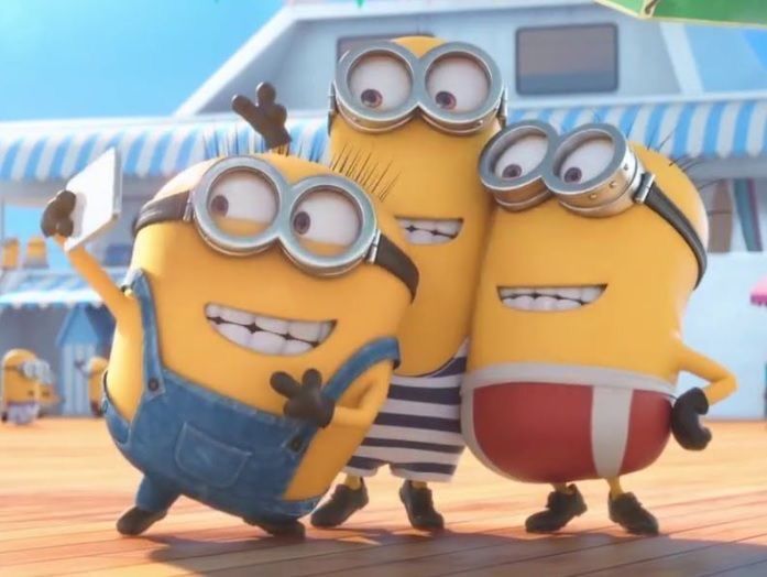 three minions from the movie despicable me