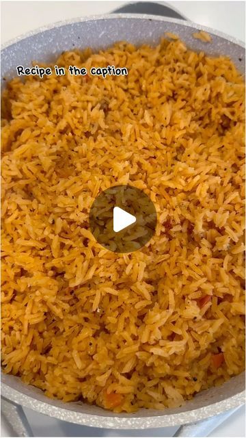 a pan filled with rice sitting on top of a stove