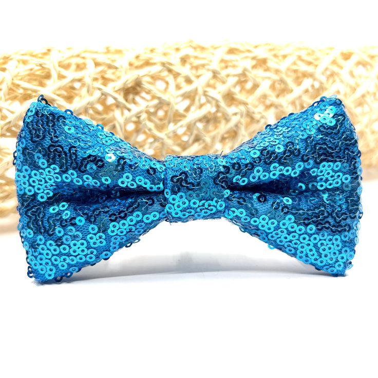 Deep Sky Blue Sequin Bow tie, Blue bow tie, Wedding bow tie, Groom bow tie, Ring bearer, Bow Tie for men, baby, boy, kids * Colors look different on computer monitors and cell phone screens. * ALL ORDERS ARE SHIPPED BY EXPRESS SHIPPING (Only USA, Canada, Europe and UK, excluding affiliated islands) * Dimensions Material: Sequin Size(approx.) Baby> 0-18 Months: 3.3 inches Toddler> 18 Months - 5 Years: 3.7 inches Kid> 5 - 10 Years: 4 inches Teen> 4.3 inches Adult> 5 inches Pocket Square: 20 x 20 C Sequin Bow Tie, Bow Tie Groom, Groom Bow Tie, Bow Tie Ring, Tie Ring, Deep Sky Blue, Bow Tie For Men, Groom Bowtie, Headband Diy