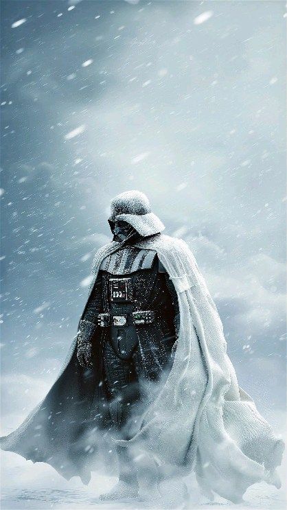 darth vader standing in the snow with his cape open and looking at something