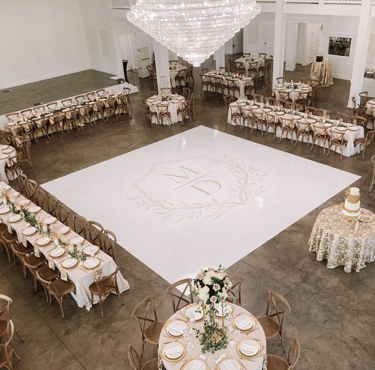 an overhead view of a dance floor with tables and chairs set up for a formal function