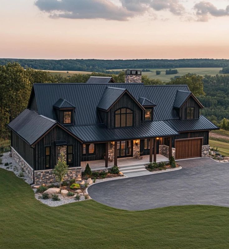 an aerial view of a large home in the country