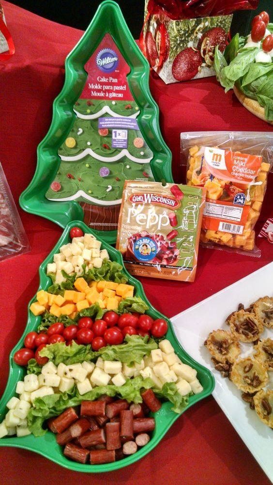 a christmas tree made out of food sitting on top of a table